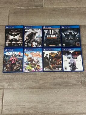 PlayStation 4 Video Games Lot (8) (Watch Dogs, Metro Redux, Batman, Far Cry 4)